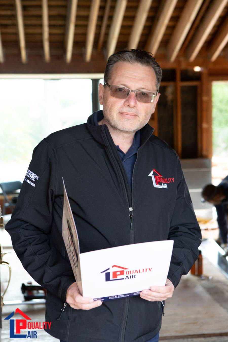 LP Quality HVAC and Plumbing team members on the job